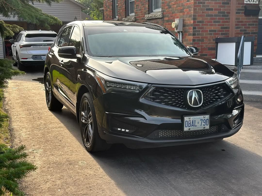Black Acura RDX A-Spec front three-quarter after detail