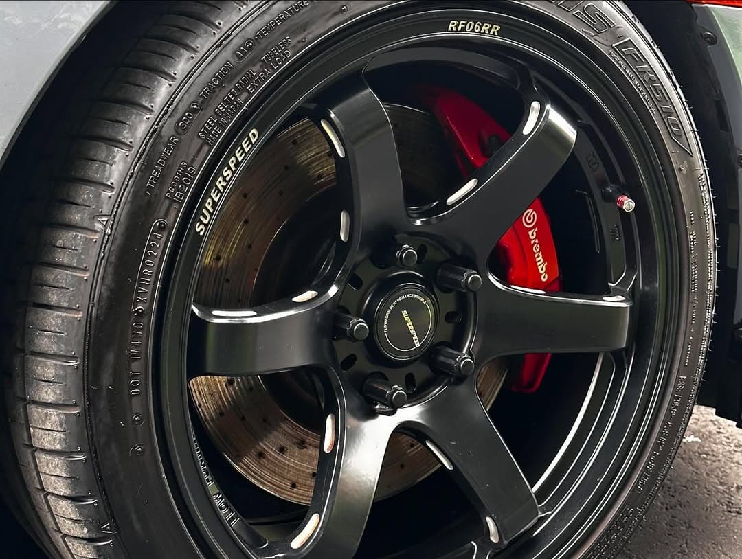 Close-up of wheel and Brembo brake caliper after detail
